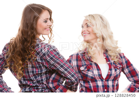 Portrait adult daughter with mother. 128828450