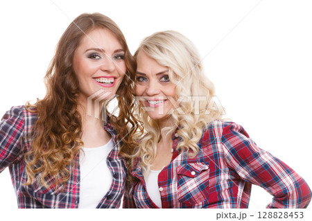 Portrait adult daughter with mother. 128828453