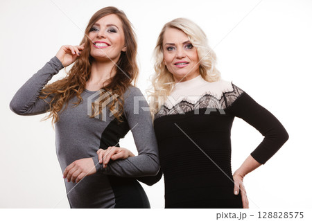Adult mother and daughter portrait 128828575