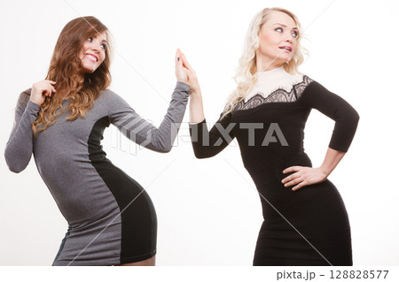 Adult mother and daughter portrait Adult mother and daughter portrait 128828577
