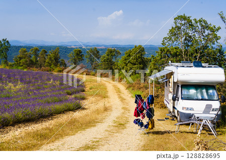 Clothes hanging to dry outdoors by camping car. Caravan vacation in France 128828695