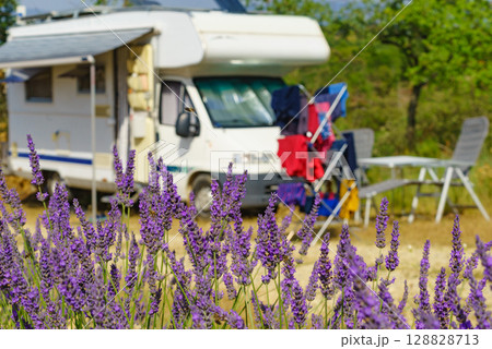 Clothes hanging to dry outdoors by camping car. Caravan vacation in France Clothes hanging to dry outdoors by camping car. Caravan vacation in France 128828713