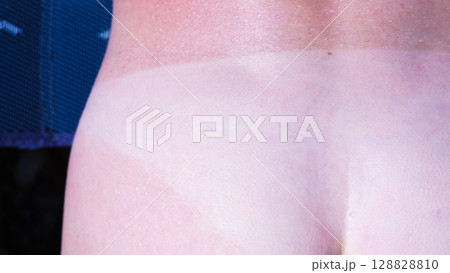 Woman body after taking off bikini with visible tan line from wearing panties 128828810
