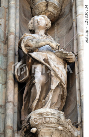 Saint Liberata, statue on the Milan Cathedral, Duomo di Santa Maria Nascente, Milan, Lombardy, Italy 128830234