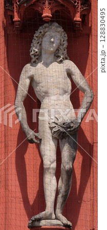 Statue of Adam on the portal of the Marienkapelle in Wurzburg, Bavaria, Germany Statue of Adam on the portal of the Marienkapelle in Wurzburg, Bavaria, Germany 128830495