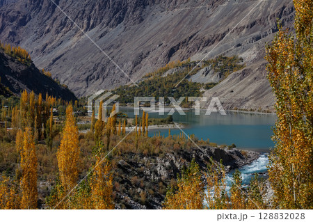 The autumn scenery with Hindu Kush mountain range in the background is very beautiful, Gahkuch,northern Pakistan. 128832028
