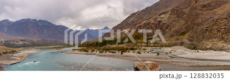 The autumn scenery with Hindu Kush mountain range in the background is very beautiful, Gahkuch,northern Pakistan. 128832035