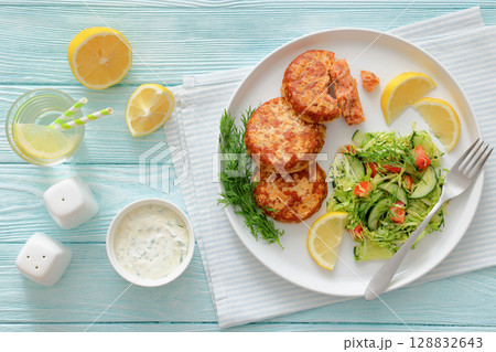 Hot Smoked salmon burgers, patties and coleslaw Hot Smoked salmon burgers, patties and coleslaw 128832643