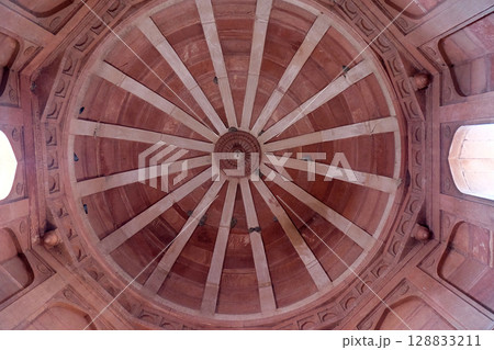 Beautiful stone carvings on the wall in Fatehpur Sikri complex, Uttar Pradesh, India Beautiful stone carvings on the wall in Fatehpur Sikri complex, Uttar Pradesh, India 128833211