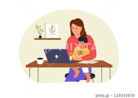 Mother Working from Home While Caring for Child 128833658