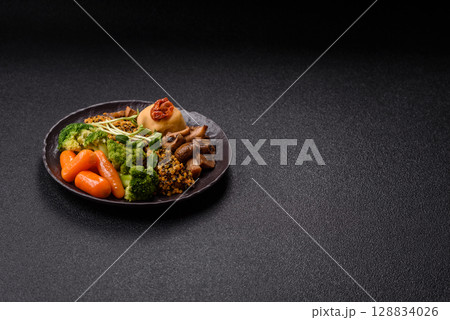 Food bowl with tofu, quinoa, broccoli and carrots, microgreens Food bowl with tofu, quinoa, broccoli and carrots, microgreens 128834026