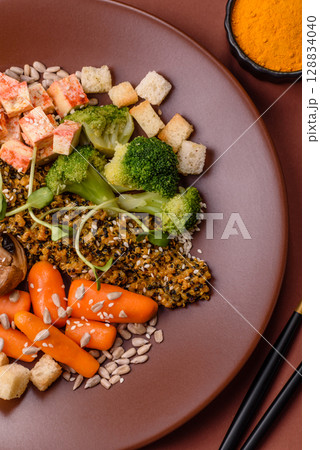 Food bowl with tofu, quinoa, broccoli and carrots, microgreens Food bowl with tofu, quinoa, broccoli and carrots, microgreens 128834040