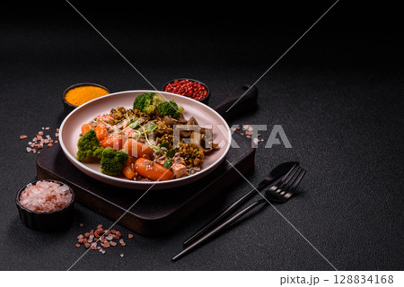 Food bowl with tofu, quinoa, broccoli and carrots, microgreens Food bowl with tofu, quinoa, broccoli and carrots, microgreens 128834168