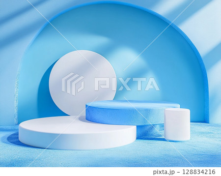 A serene product display featuring a variety of white cylindrical and rectangular podiums and a large circle against a soft blue arched backdrop. 128834216