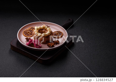 Round chocolate tart or pie with cream berry filling Round chocolate tart or pie with cream berry filling 128834527