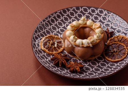 Round chocolate tart or pie with cream berry filling 128834535