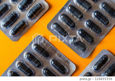 Lots of pills in a blister packs. Medical drug. Medicine. Medical background 128835350