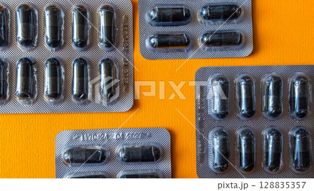 Lots of pills in a blister packs. Medical drug. Medicine. Medical background Lots of pills in a blister packs. Medical drug. Medicine. Medical background 128835357