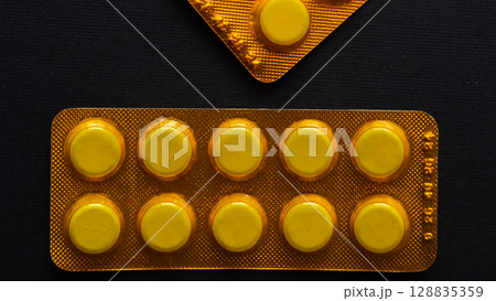 Lots of pills in a blister packs. Medical drug. Medicine. Medical background 128835359