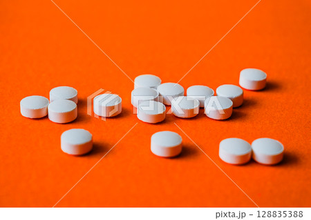 Lots of pills in a blister packs. Medical drug. Medicine. Medical background Lots of pills in a blister packs. Medical drug. Medicine. Medical background 128835388