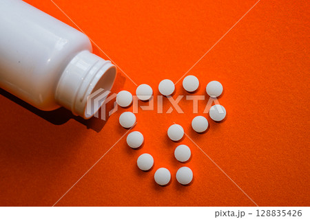 Lots of pills in a blister packs. Medical drug. Medicine. Medical background Lots of pills in a blister packs. Medical drug. Medicine. Medical background 128835426