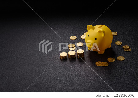Piggy bank as a financial conceptual background with coins, doing business, saving money 128836076