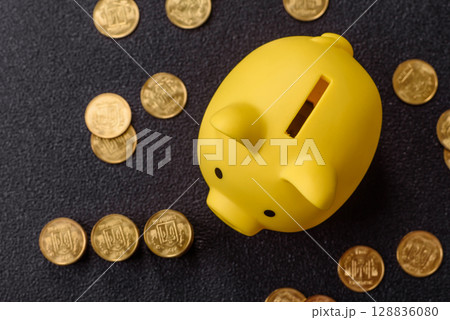 Piggy bank as a financial conceptual background with coins, doing business, saving money 128836080