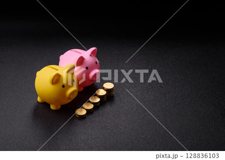 Piggy bank as a financial conceptual background with coins, doing business, saving money 128836103