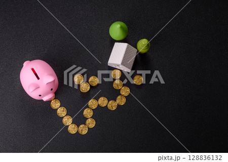 Piggy bank as a financial conceptual background with coins, doing business, saving money 128836132
