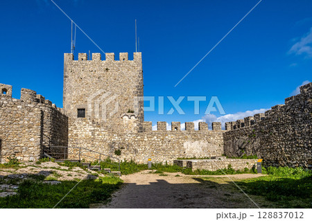 Moorish Sesimbra castle with walls and wall walk in Sesimbra, Portugal Moorish Sesimbra castle with walls and wall walk in Sesimbra, Portugal 128837012
