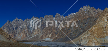 The autumn scenery with Tupopdan, Passu Cathedral or Passu Cones, is a mountain in northern Pakistan The autumn scenery with Tupopdan, Passu Cathedral or Passu Cones, is a mountain in northern Pakistan 128837307
