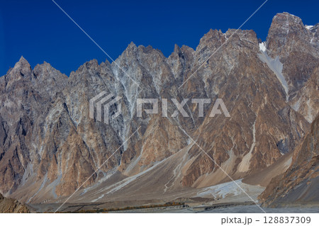The autumn scenery with Tupopdan, Passu Cathedral or Passu Cones, is a mountain in northern Pakistan 128837309