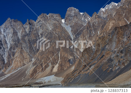 The autumn scenery with Tupopdan, Passu Cathedral or Passu Cones, is a mountain in northern Pakistan The autumn scenery with Tupopdan, Passu Cathedral or Passu Cones, is a mountain in northern Pakistan 128837313