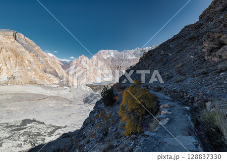 The autumn scenery with Tupopdan, Passu Cathedral or Passu Cones, is a mountain in northern Pakistan The autumn scenery with Tupopdan, Passu Cathedral or Passu Cones, is a mountain in northern Pakistan 128837330