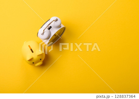 Piggy bank as a financial conceptual background with coins, doing business 128837364