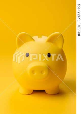 Piggy bank as a financial conceptual background with coins, doing business Piggy bank as a financial conceptual background with coins, doing business 128837405