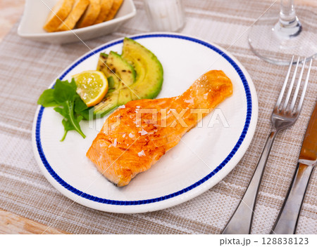Salmon with avocado slices and lime Salmon with avocado slices and lime 128838123