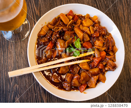Chinese dish beef stew served with parsley 128838470