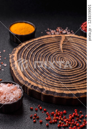Wooden cutting board blank as a backdrop for cooking in the kitchen 128839001