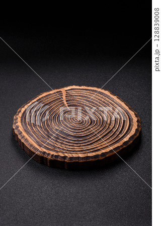 Wooden cutting board blank as a backdrop for cooking in the kitchen 128839008