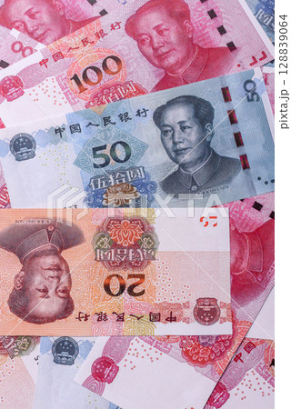 Chinese paper money yuan renminbi, Chinese banknotes as background Chinese paper money yuan renminbi, Chinese banknotes as background 128839064