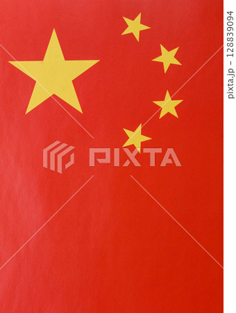 China, Chinese red flag with stars as background China, Chinese red flag with stars as background 128839094