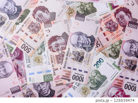 Money, Mexican currency, peso banknotes. Conceptual financial background 128839474