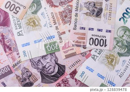 Money, Mexican currency, peso banknotes. Conceptual financial background Money, Mexican currency, peso banknotes. Conceptual financial background 128839478