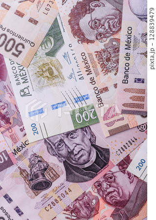 Money, Mexican currency, peso banknotes. Conceptual financial background Money, Mexican currency, peso banknotes. Conceptual financial background 128839479