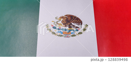 Mexico, Mexican flag of three colors with an eagle as a symbol of independence 128839498