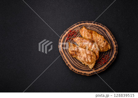 Chicken breast, grilled fillet, meat meal on a plate 128839515