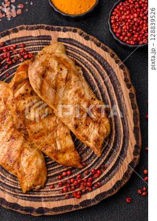 Chicken breast, grilled fillet, meat meal on a plate Chicken breast, grilled fillet, meat meal on a plate 128839526