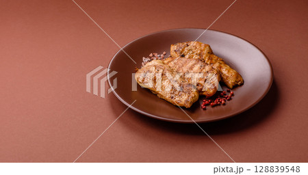 Chicken breast, grilled fillet, meat meal on a plate 128839548