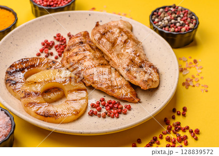 Chicken breast, grilled fillet, meat meal on a plate 128839572